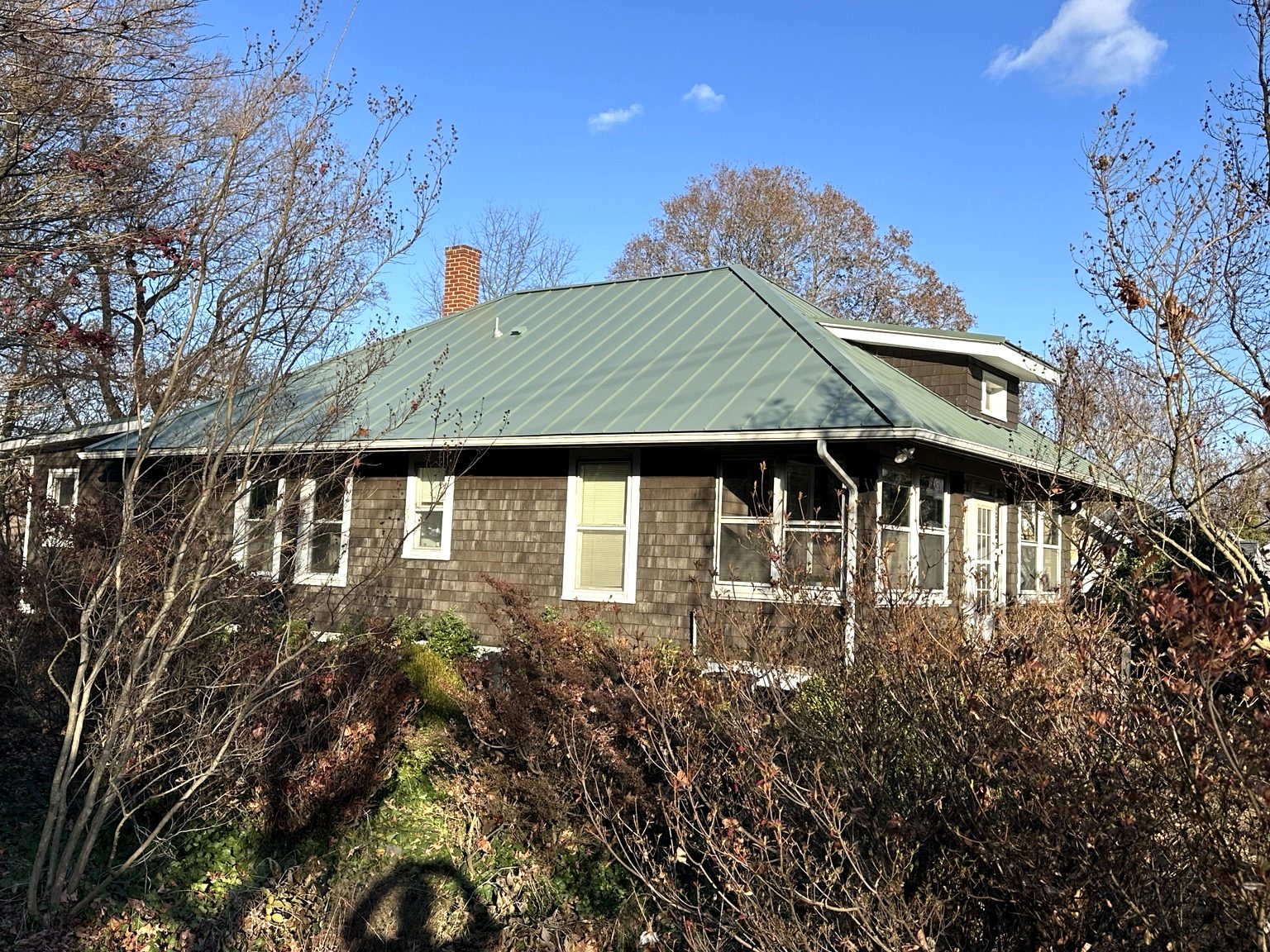 Gray standing seam metal roof closeup